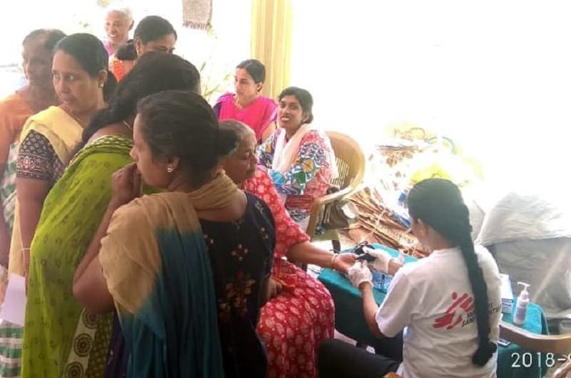 An MSF nurse carrying out basic health screening of women visiting the medical camp. Photo: MSF