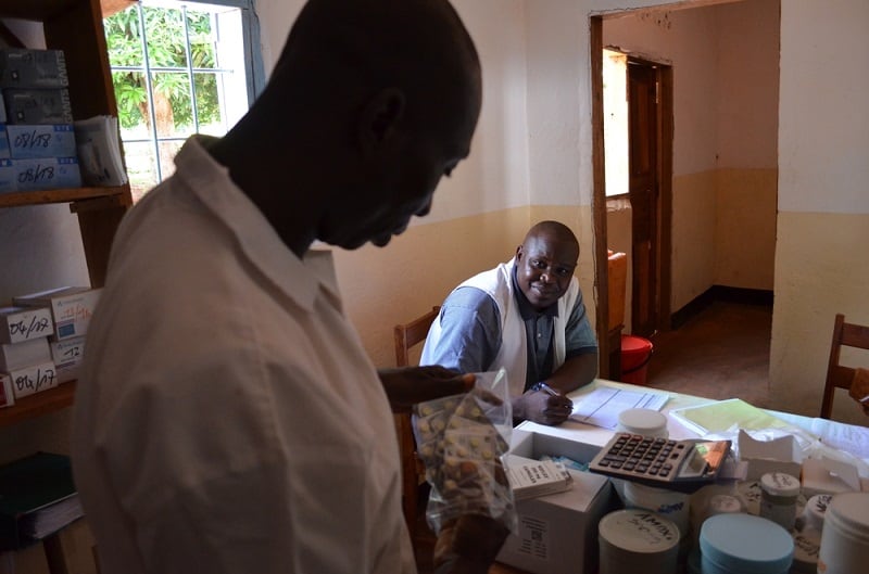 Nurse P&eacute;l&eacute; (left) and a pharmacist in Mbalazime health centre carry out an inventory of the latest MSF supply delivery. Photo: Sandra Smiley/MSF