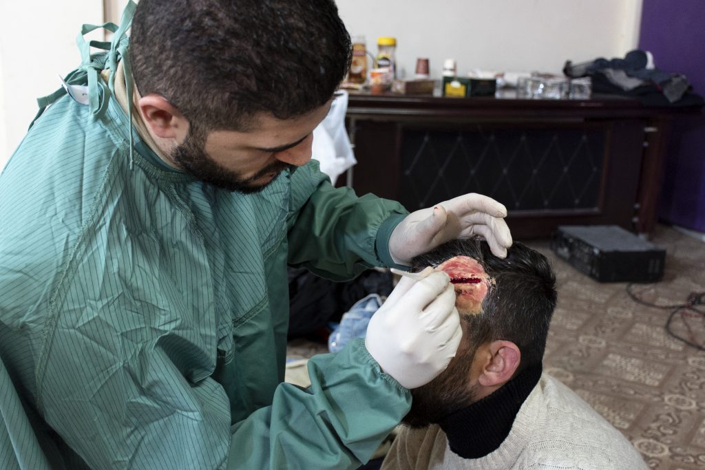 A volunteer being prepared to act as a simulated patient for a mass casualty simulation, in Al-Hakim General Hospital at Najaf governorate, Iraq. February 2020. ©MSF/HASSAN KAMAL AL-DEEN