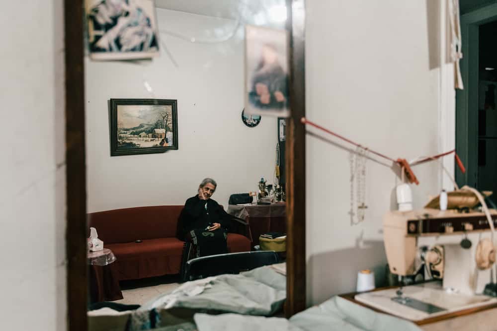 Despite her age, Thérèse was still doing some small sewing jobs but her machine was broken in the explosion, depriving her of her only source of income. “This sewing machine has been with me since 1973. It’s like a life partner to me.” Lebanon, December 2020.© KARINE PIERRE/HANS LUCASINSTAGRAM: @PICS_STONE