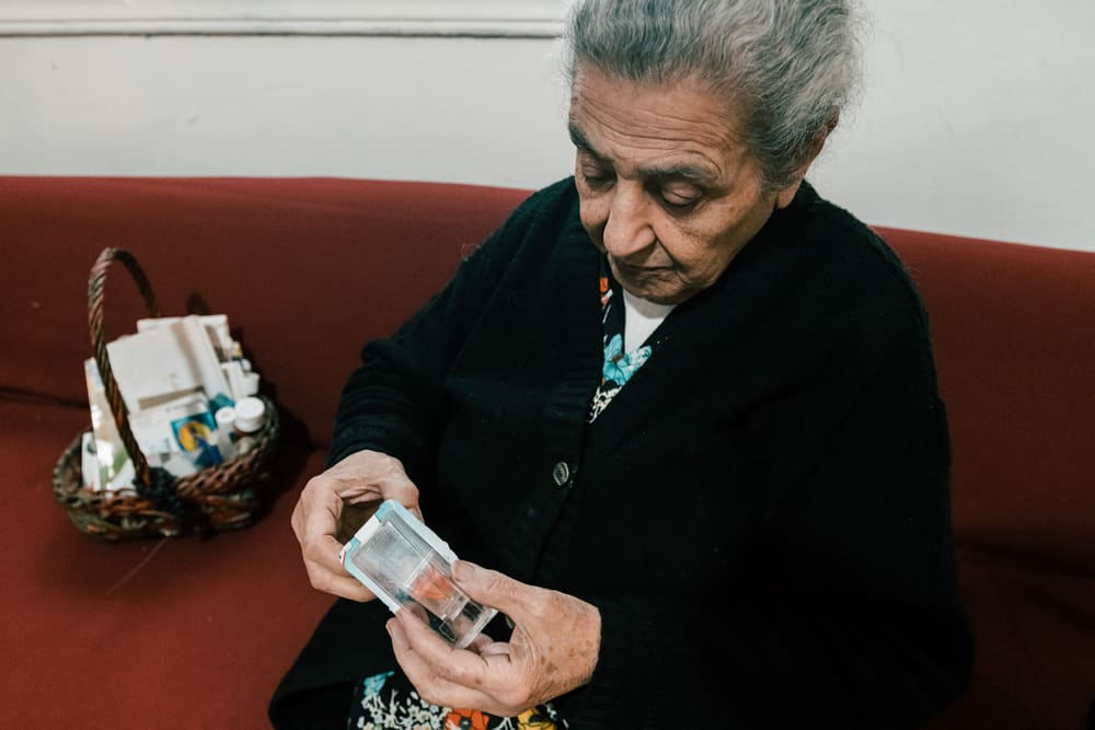 Thérèse was recently diagnosed with diabetes and her hypertension has increased. “I think this is all linked to the explosion. I take my medicines carefully every day because I couldn’t afford the hospital fees if I should have any serious medical issues.” Lebanon, December 2020. © KARINE PIERRE/HANS LUCASINSTAGRAM: @PICS_STONE