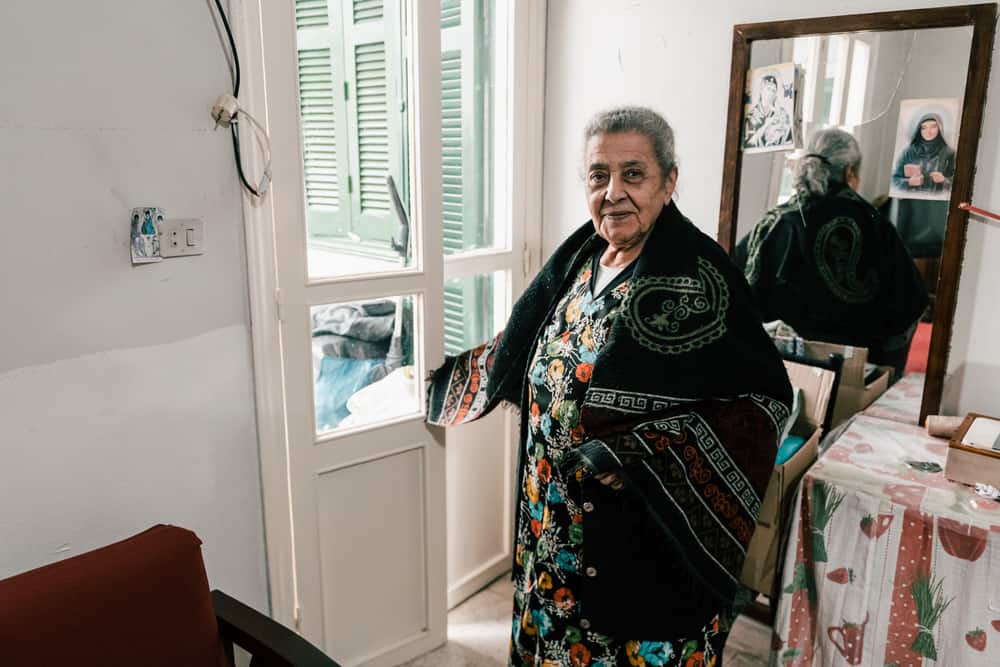 Thérèse is 85 years old. This Lebanese former tailor lives in Karantina, a neighbourhood located near Beirut’s port. Lebanon, December 2020. © KARINE PIERRE/HANS LUCASINSTAGRAM: @PICS_STONE
