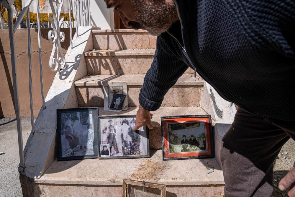Semra Karaca, Sultan Kodaş, Hüseyin Kodaş and Şengül Kodaş (from left to right) live together as a family in Ören village, on the outskirsts of Malatya, Türkiye. They have been greatly affected by the recent earthquakes, as well as heavy flooding in the region. "There are earthquakes on the one hand and rain on the other. We don’t know what will happen in the future. I’m here with my wife, my siblings, my children, and my mother. Our belongings are drowned in water because of the flood, we can't find anything to wear, the neighbour brought us these clothes for now. We were staying in a tent, but the tent got flooded too. We are now trying to dry what we took out of the house, including our family photos. The children are scared. The situation is very dire”, says Hüseyin Kodaş.