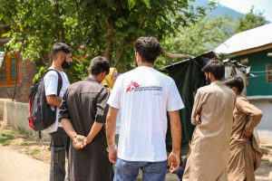 Doctors Without Borders India/Médecins Sans Frontières (MSF) community mental health workers speak with community members in a neighborhood of Tral, Kashmir. The team provides information about mental health conditions and explains the free counseling and support services available through MSF's mental health program in the region.