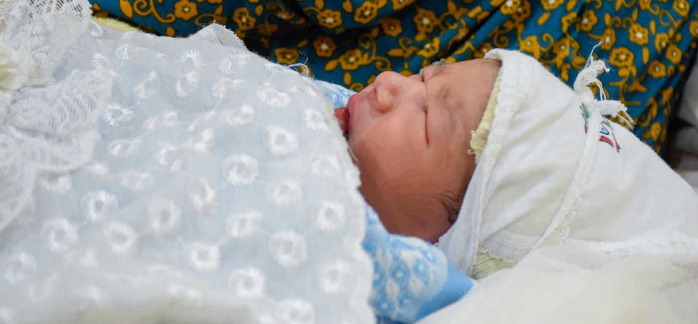 Mother: Najlaa Mohammad “I live in Mosul in the western part. This is the first time I come to Nablus hospital. My relatives and neighbours gave birth in this hospital. My sisters and my nieces gave birth in this place. I have been childless for nine years, but God graced me with this baby suddenly. This is my third baby. When I was told I was pregnant I was shocked and I started crying and I did not believe them. It is an indescribable feeling. As soon as the labor pains restarted, I arrived at the hospital at 01:00pm. The doctor told me to wait until the night comes and maybe even until dawn. When the bleeding started, that is when they rushed me into the operation room. Today is my third day in this hospital since I had a caesarean, but I will be discharged today. This time, my sisters will come to pick me up instead of coming as visitors. I cannot describe my happiness, leaving the hospital and with me my child, little Mahmoud.”